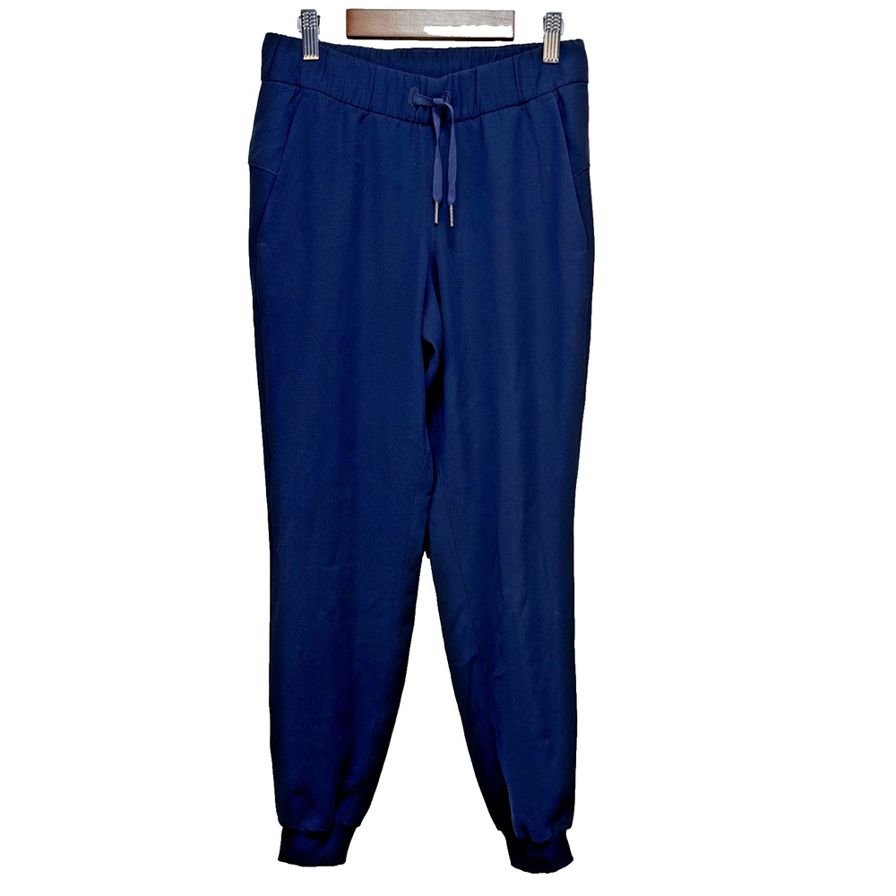 Lululemon Womens On The Fly Jogger Size 4 True Navy Travel Woven Pockets